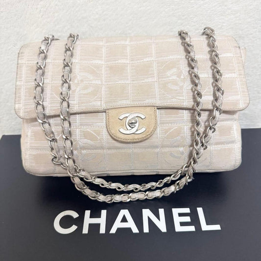 Vintage Chanel New Travel Line Canvas Flap Bag Beige